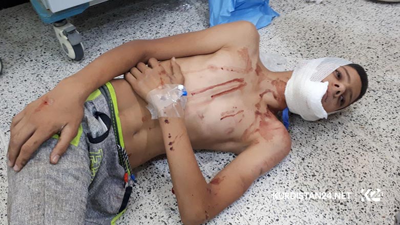 بالصور.. انقلاب حافلة تقل سائحين عند جبل قرب السليمانية